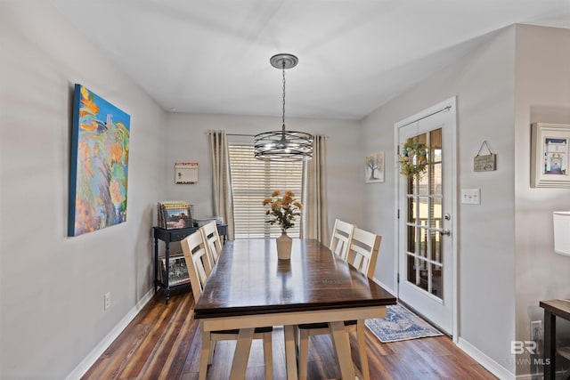 dining area with plenty of natural light, dark wood-type flooring, and baseboards