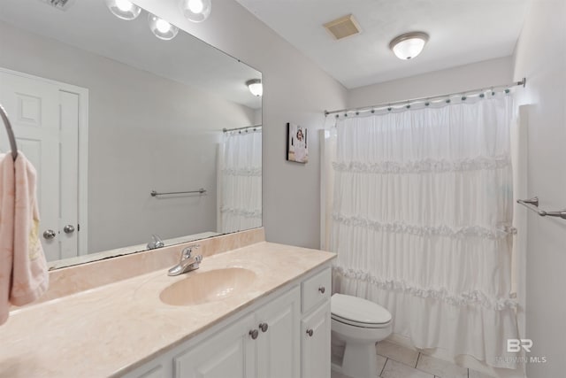 full bathroom with vanity, visible vents, curtained shower, tile patterned floors, and toilet