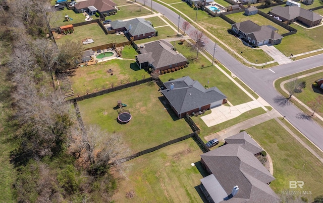 drone / aerial view with a residential view