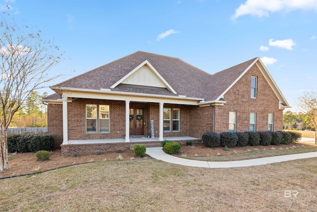 view of front of home featuring a porch and a front yard