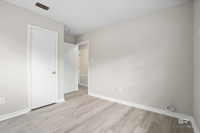 unfurnished bedroom with light hardwood / wood-style floors