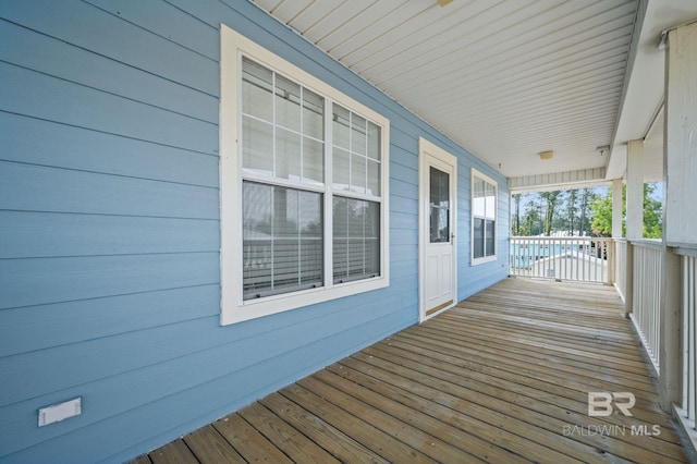 5584 Pensacola Ave, Orange Beach, AL 36561 - wooden terrace with a porch