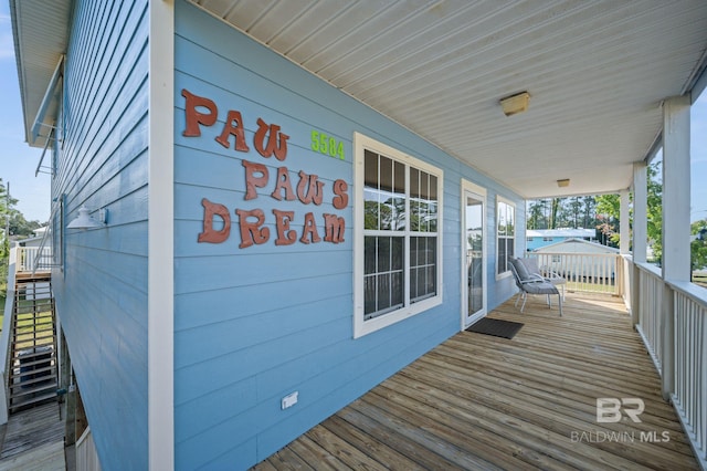 5584 Pensacola Ave, Orange Beach, AL 36561 - wooden terrace featuring stairway