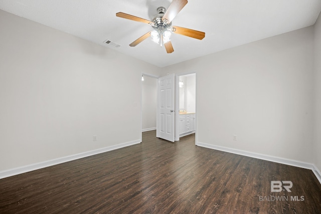 5584 Pensacola Ave, Orange Beach, AL 36561 - empty room featuring a ceiling fan, baseboards, visible vents, and dark wood-type flooring