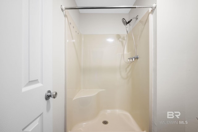 5584 Pensacola Ave, Orange Beach, AL 36561 - bathroom featuring walk in shower