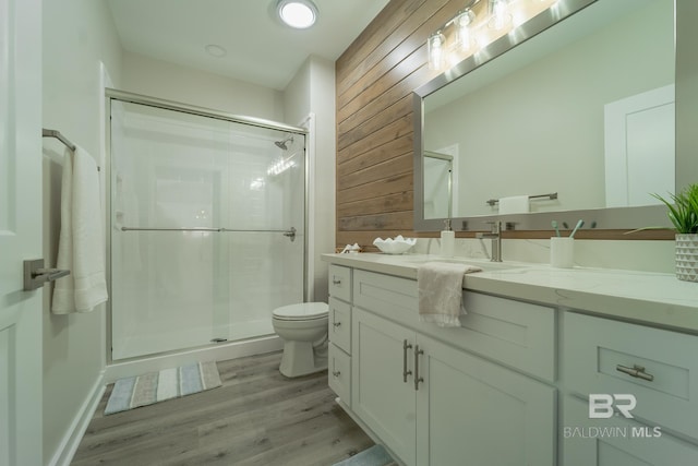 11341 Tall Timber Ln, Elberta, AL 36530 - full bathroom featuring vanity, a shower stall, and wood finished floors