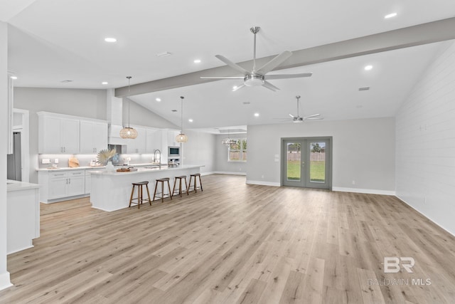 11341 Tall Timber Ln, Elberta, AL 36530 - living area featuring high vaulted ceiling, light wood-type flooring, a ceiling fan, and recessed lighting