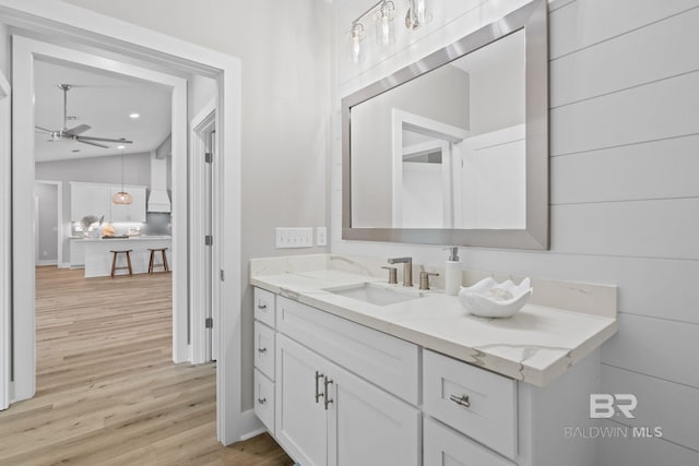11341 Tall Timber Ln, Elberta, AL 36530 - bathroom featuring wood finished floors, vanity, ceiling fan, and lofted ceiling