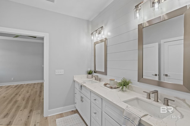 11341 Tall Timber Ln, Elberta, AL 36530 - full bathroom with wood finished floors and double vanity