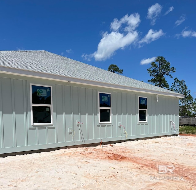11341 Tall Timber Ln, Elberta, AL 36530 - back of house featuring board and batten siding and roof with shingles