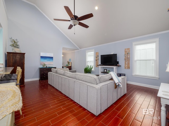 living room with a wealth of natural light, crown molding, ceiling fan, and dark hardwood / wood-style flooring