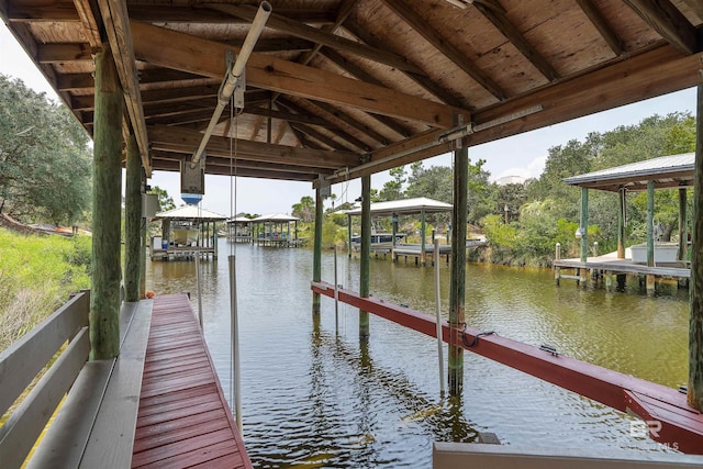 view of dock with a water view