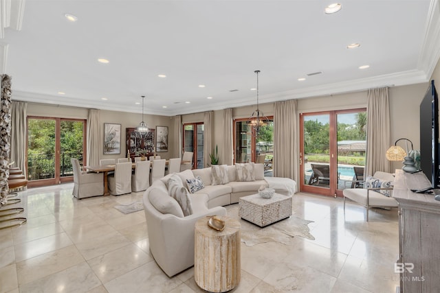 tiled living room featuring ornamental molding, a chandelier, and a wealth of natural light