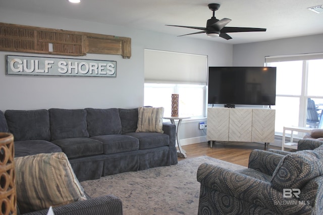1757 W Beach Blvd, Gulf Shores, AL 36542 - living area featuring ceiling fan, wood finished floors, and baseboards
