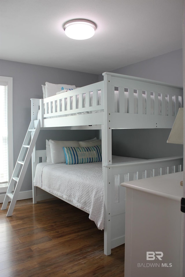 1757 W Beach Blvd, Gulf Shores, AL 36542 - bedroom featuring wood finished floors and multiple windows