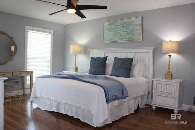 1757 W Beach Blvd, Gulf Shores, AL 36542 - bedroom with dark wood finished floors, multiple windows, and a ceiling fan