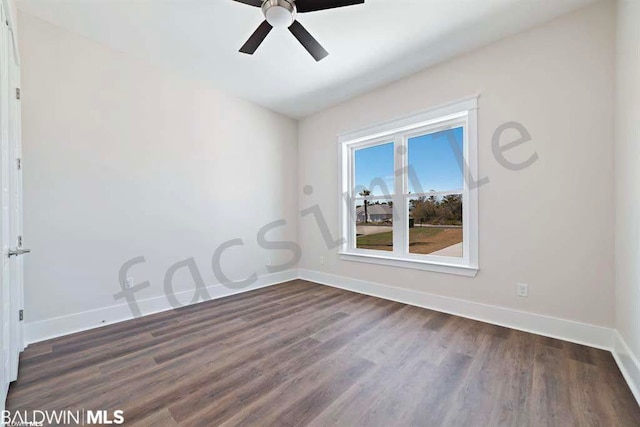 unfurnished room featuring dark hardwood / wood-style flooring and ceiling fan