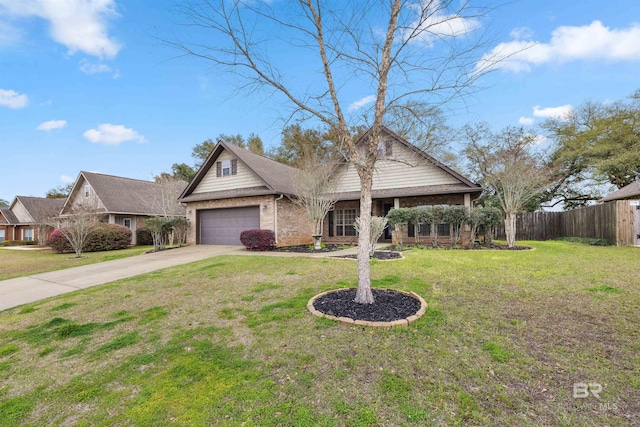 view of front of property featuring a front lawn and a garage