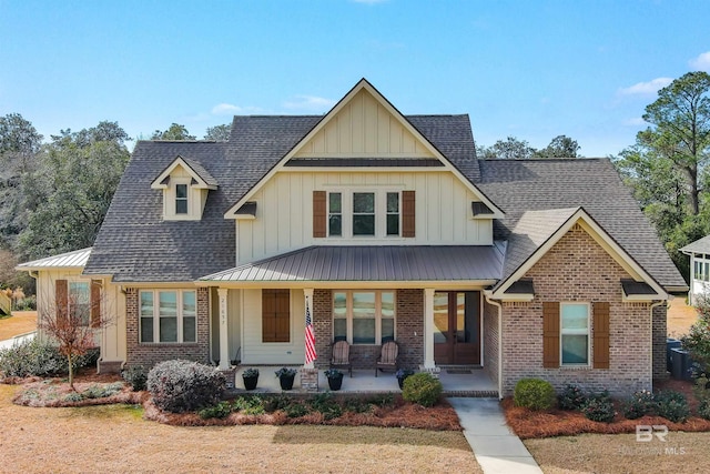 view of front of property featuring covered porch