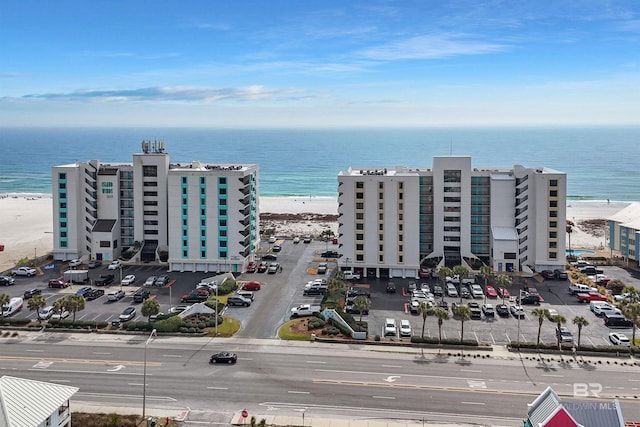 aerial view featuring a water view and a view of the beach