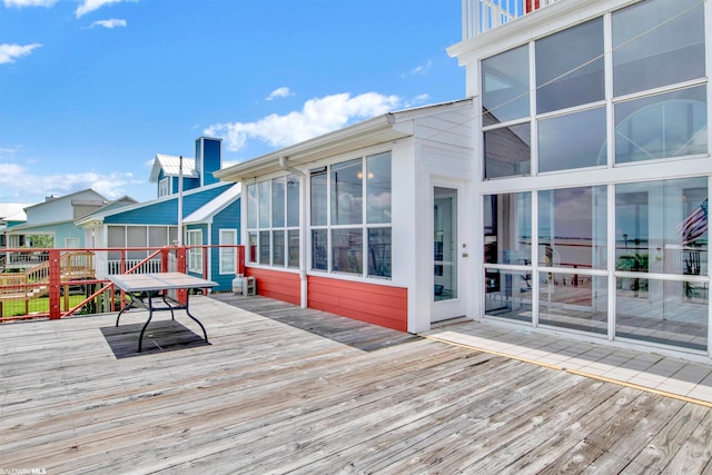 deck featuring a sunroom