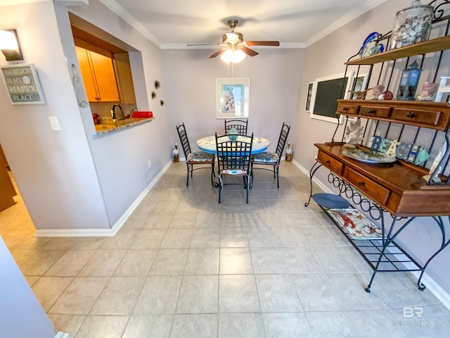 dining room featuring ornamental molding and ceiling fan