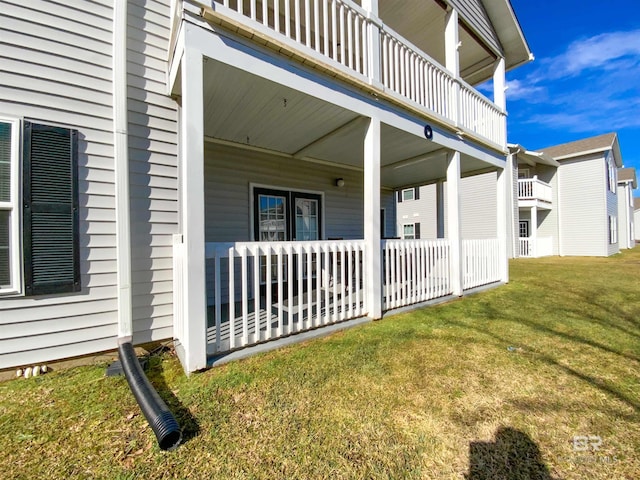 view of home's exterior with a yard