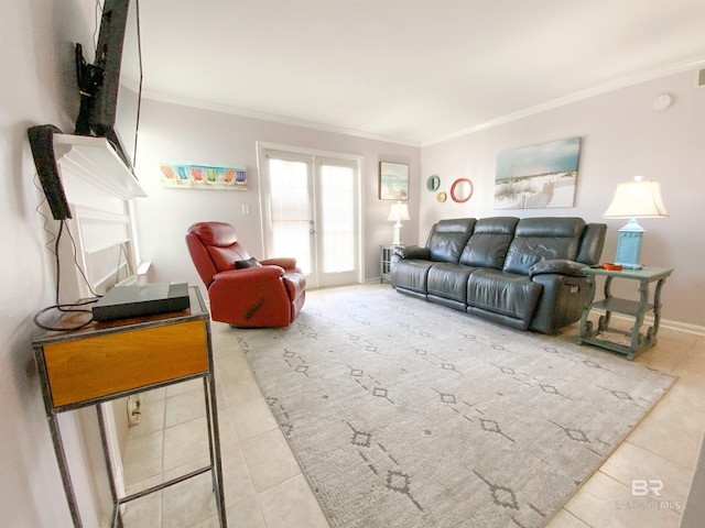 tiled living room with ornamental molding and french doors