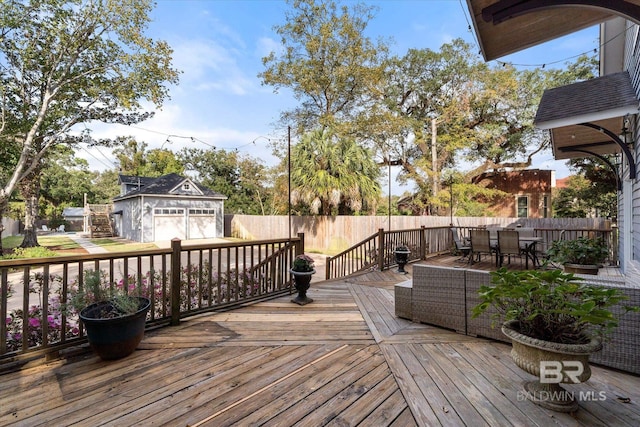 wooden terrace featuring a garage