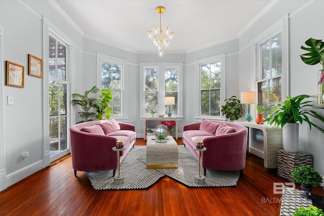 sunroom with a healthy amount of sunlight and a chandelier