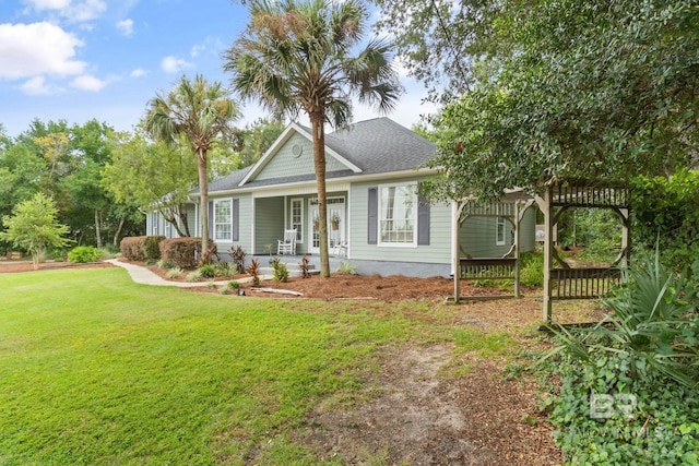 view of front facade with a pergola and a front lawn