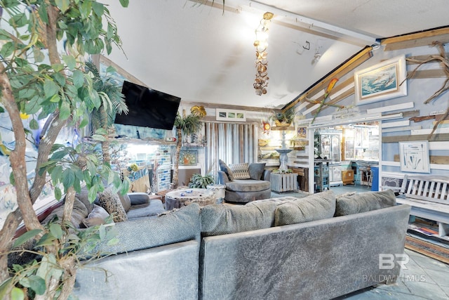 living room featuring lofted ceiling with beams