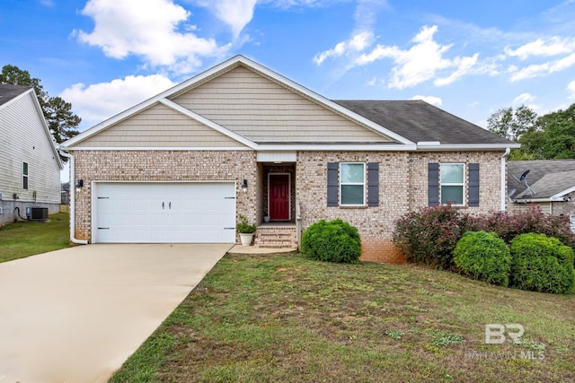 view of front of home with a garage, a front lawn, and central AC