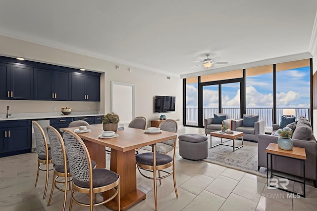 533 E Beach Blvd Unit 2403, Gulf Shores, AL 36542 - dining room featuring crown molding, a wall of windows, a ceiling fan, and light marble finish flooring