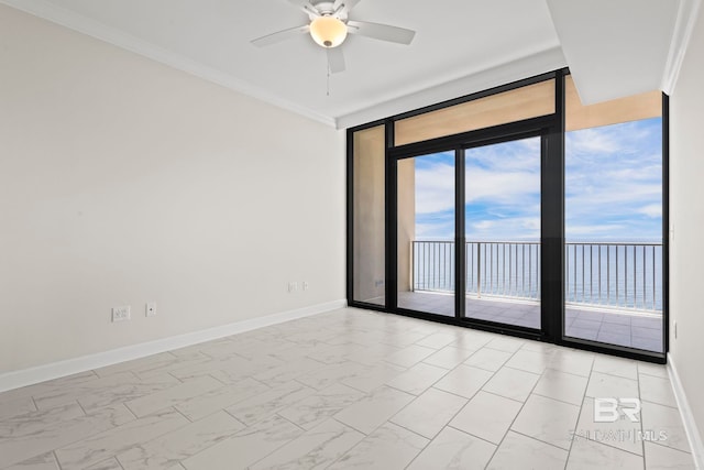 533 E Beach Blvd Unit 2403, Gulf Shores, AL 36542 - unfurnished room with expansive windows, a ceiling fan, light marble finish floors, and crown molding