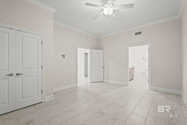 533 E Beach Blvd Unit 2403, Gulf Shores, AL 36542 - unfurnished bedroom featuring light marble finish floors, ornamental molding, a closet, connected bathroom, and ceiling fan