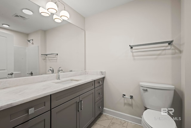 533 E Beach Blvd Unit 2403, Gulf Shores, AL 36542 - bathroom with vanity, marble look tile flooring, and a shower