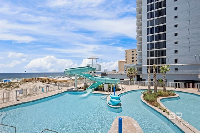 533 E Beach Blvd Unit 2403, Gulf Shores, AL 36542 - community pool with a water slide and a water view