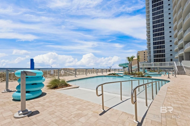 533 E Beach Blvd Unit 2403, Gulf Shores, AL 36542 - community pool with a patio area