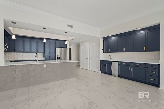 533 E Beach Blvd Unit 2403, Gulf Shores, AL 36542 - kitchen with appliances with stainless steel finishes, blue cabinetry, ornamental molding, light countertops, and a peninsula