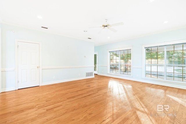 spare room with ceiling fan and light hardwood / wood-style flooring