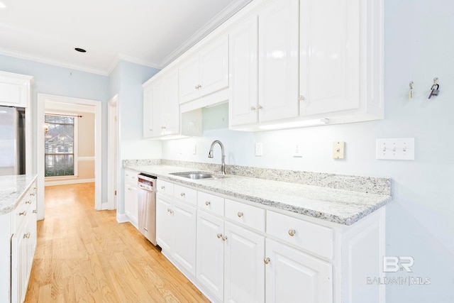 kitchen featuring sink, light hardwood / wood-style flooring, light stone counters, white cabinets, and stainless steel dishwasher