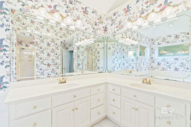 bathroom with tile patterned flooring, vanity, and shower with separate bathtub