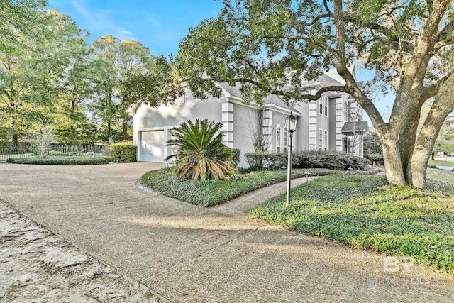 exterior space with a garage