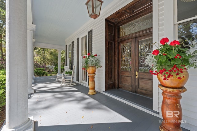 2550 Springhill Ave, Mobile, AL 36607 - view of exterior entry with a porch and french doors