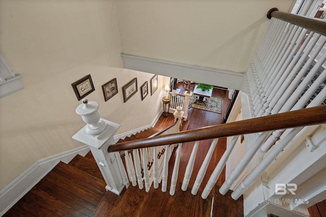 2550 Springhill Ave, Mobile, AL 36607 - stairs featuring wood finished floors and baseboards