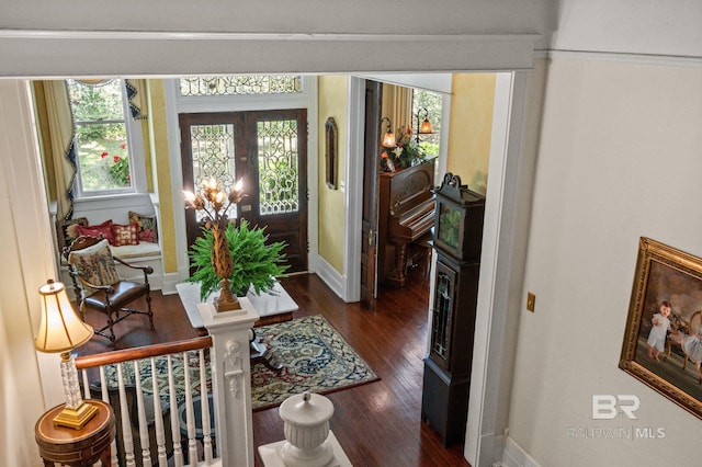 2550 Springhill Ave, Mobile, AL 36607 - foyer featuring baseboards and wood finished floors