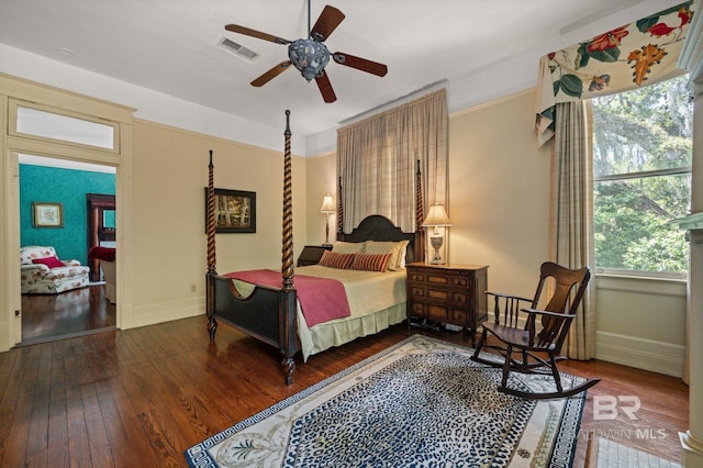 2550 Springhill Ave, Mobile, AL 36607 - bedroom with baseboards, hardwood / wood-style floors, and visible vents