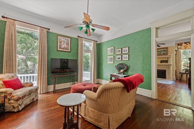 2550 Springhill Ave, Mobile, AL 36607 - living area with hardwood / wood-style floors, a fireplace, and ceiling fan