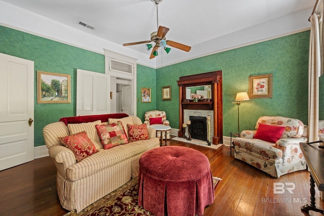 2550 Springhill Ave, Mobile, AL 36607 - living room featuring hardwood / wood-style floors, visible vents, a ceiling fan, baseboards, and a fireplace